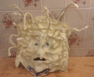 Medusa mask with snakes.